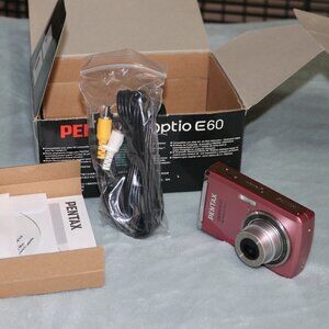 Pentax Optio E60 10.1 MP 3x optical zoom camera. Pink.
